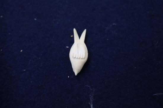 A carved ivory animal group